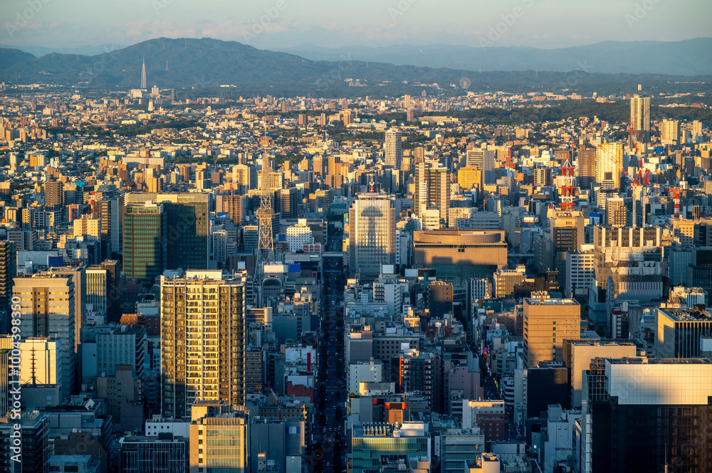 sunset or sun rise of Nagooya cityscape with office building and downtown and Skyline twilight sky in summer season, Nagoya city, Aichi, Japan