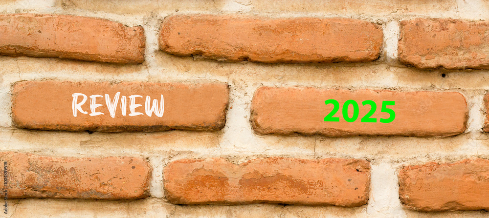 Planning review 2025 new year symbol. Concept words Review 2025 on beautiful brown brick wall. Beautiful brown brick wall background. Business review 2025 new year concept. Copy space. Planning review 2025 new year symbol. Concept words Review 2025 on beautiful brown brick wall. Beautiful brown brick wall background. Business review 2025 new year concept. Copy space.