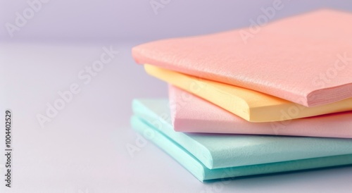 Colorful Stacked Sticky Notes on a Soft Purple Table With a Gradient Background
