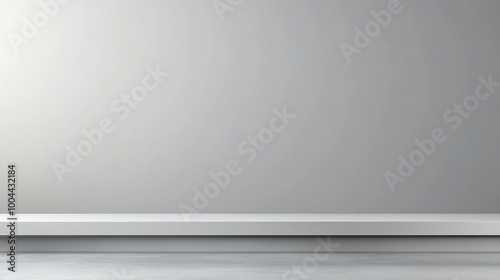 Minimalist gray wall with a white shelf, ideal for displaying products or artwork.