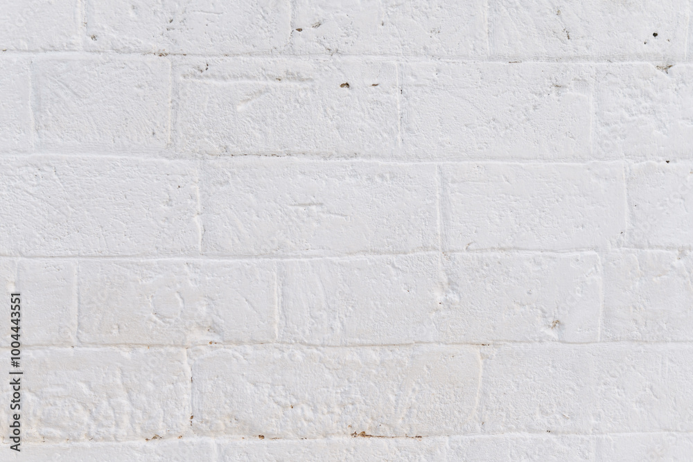 Wall white brick wall texture background. Big brick of tuff wall by an italian house. Brickwork stonework Wall white brick wall texture background. Big brick of tuff wall by an italian house. Brickwork stonework