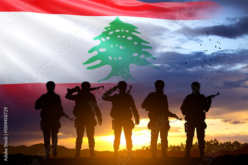 Obraz na plátně Silhouette of a soldier with Lebanon flag against the sunset