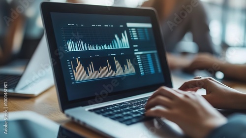 Data Analysis on Laptop in a Modern Workspace