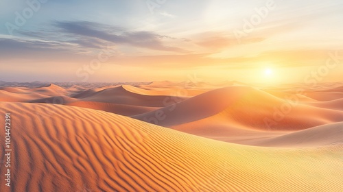 Golden sand dunes under a vibrant sunset sky, creating a serene and beautiful desert landscape.