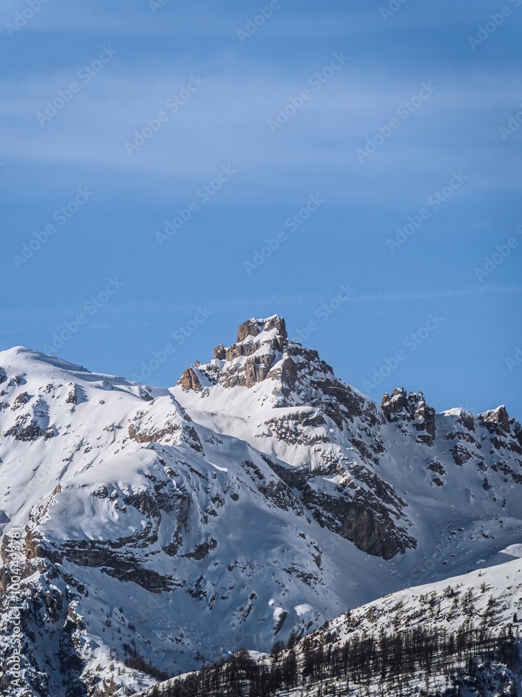 Snow-covered mountains of Serre Chevalier in Briançon, France Snow-covered mountains of Serre Chevalier in Briançon, France