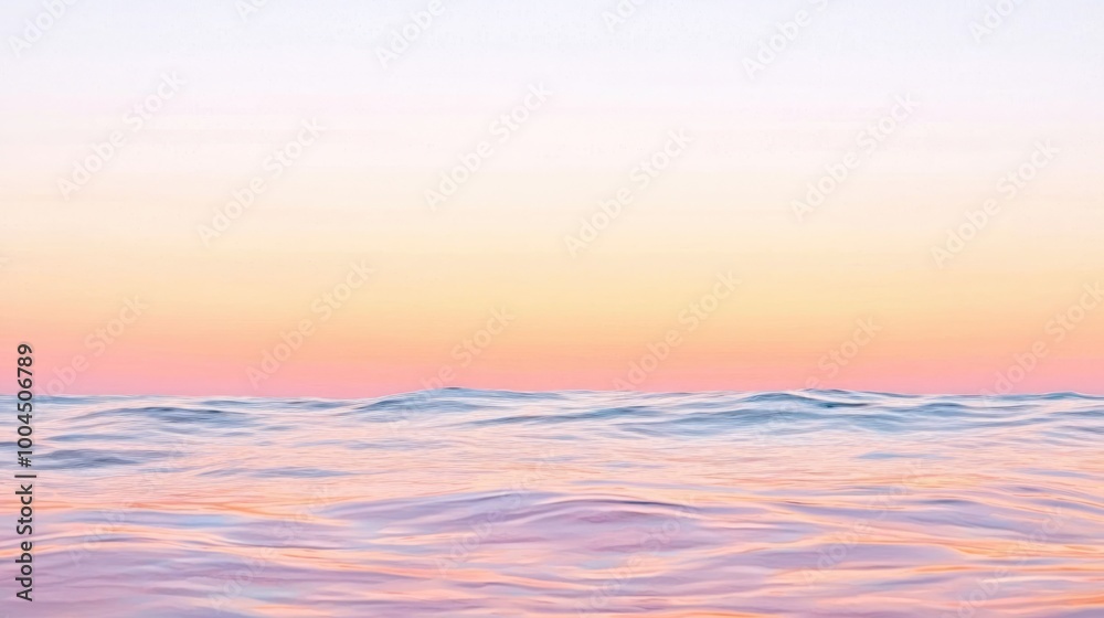 Obraz premium A serene ocean view at sunset, featuring soft pastel colors and gentle waves, creating a tranquil and calming atmosphere.