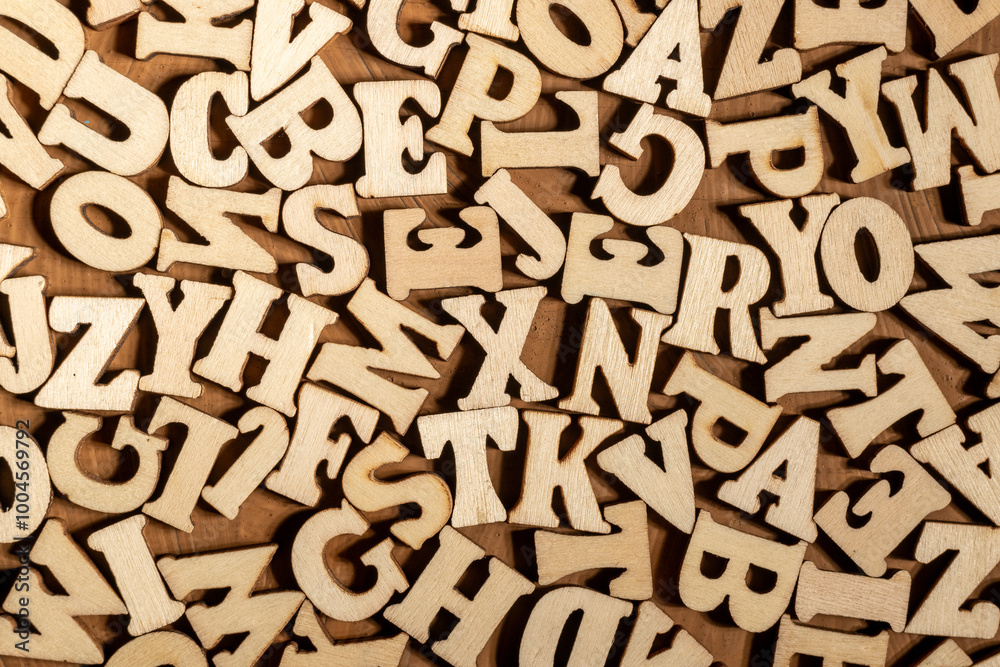 The background is made of wooden letters of various meanings. letters carved from wood