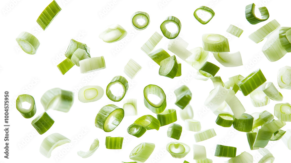A Splash of Green: Sliced Green Onions Falling in Mid-Air Against a White Background A Splash of Green: Sliced Green Onions Falling in Mid-Air Against a White Background