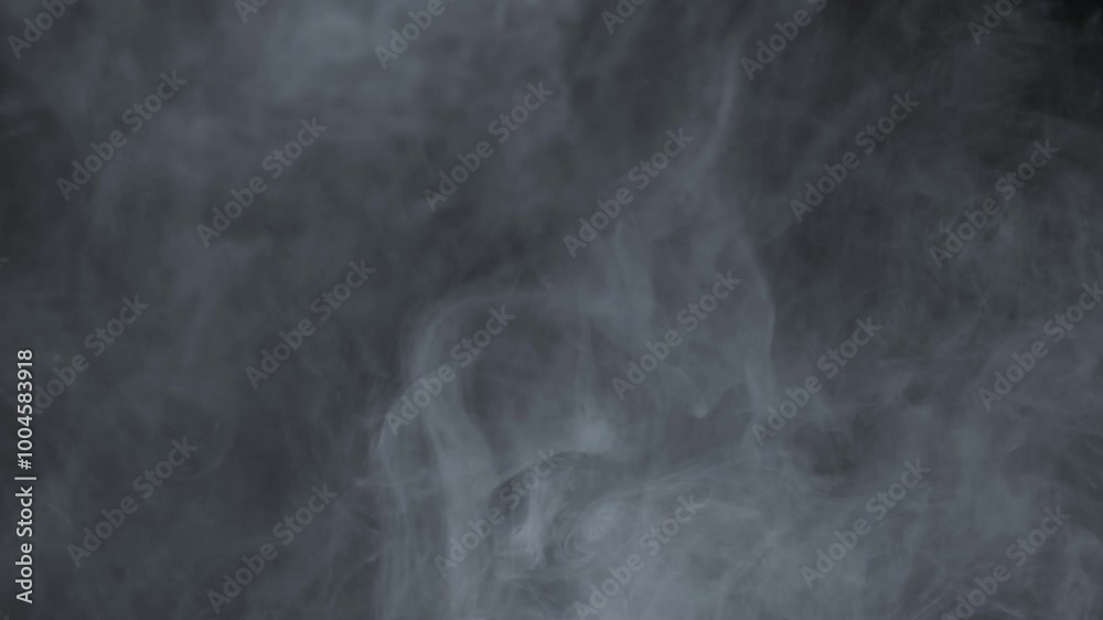 Abstract white smoke in slow motion. Smoke, Cloud of cold fog in light spot background. Light, white, fog, cloud, black background, 4k, ice smoke cloud. Floating fog.