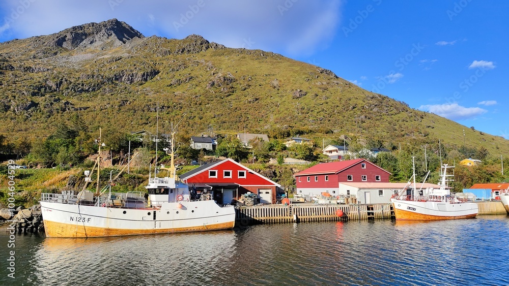 Village on the coast under the mountains in northern Norway beautiful nature Village on the coast under the mountains in northern Norway beautiful nature