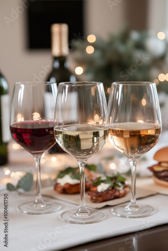 Red, white and rose wine in glasses on the dining table..