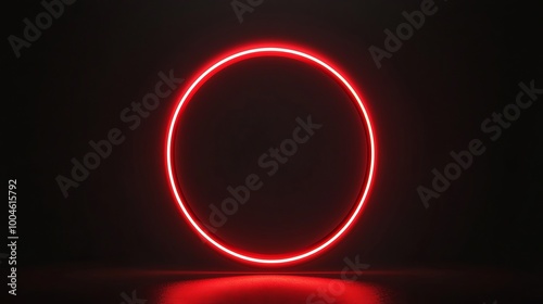 Red neon light glowing in dark empty room forming circle shape