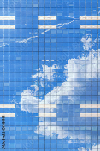 South Tower skyscraper modernism architecture style, modern high-rise office building, abstract details of facade glass curtain wall cells reflecting white clouds in blue sky, Brussels city, Belgium