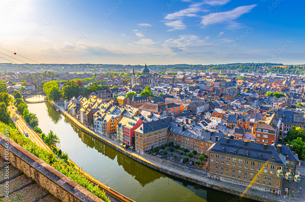 Obraz premium Namur cityscape, aerial panoramic view of Namur city historical center with Sambre river embankment and St Aubin's cathedral, skyline panorama of Namur fields on horizon, Wallonia Region, Belgium