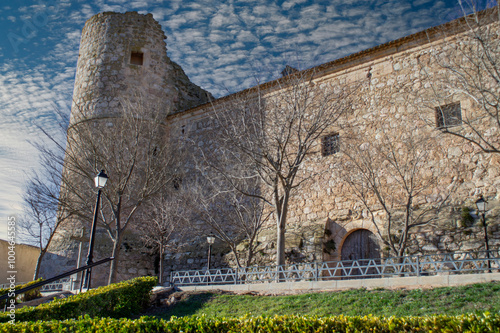 Defense tower and wall of the castle of Garcimuñoz, Cuenca.
