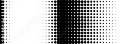 Halftone pattern transition from white to black, showcasing circular dots, creating a dynamic visual effect in modern graphic design