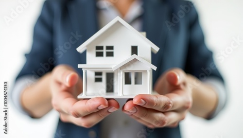 Wallpaper Mural 3D House Model in Hands, Symbol of Buying, Building, or Financing a New Dream Home Torontodigital.ca