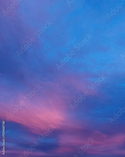 clouds in the morning sky in blue an pink