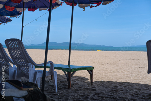 beach chairs and umbrella on the beach