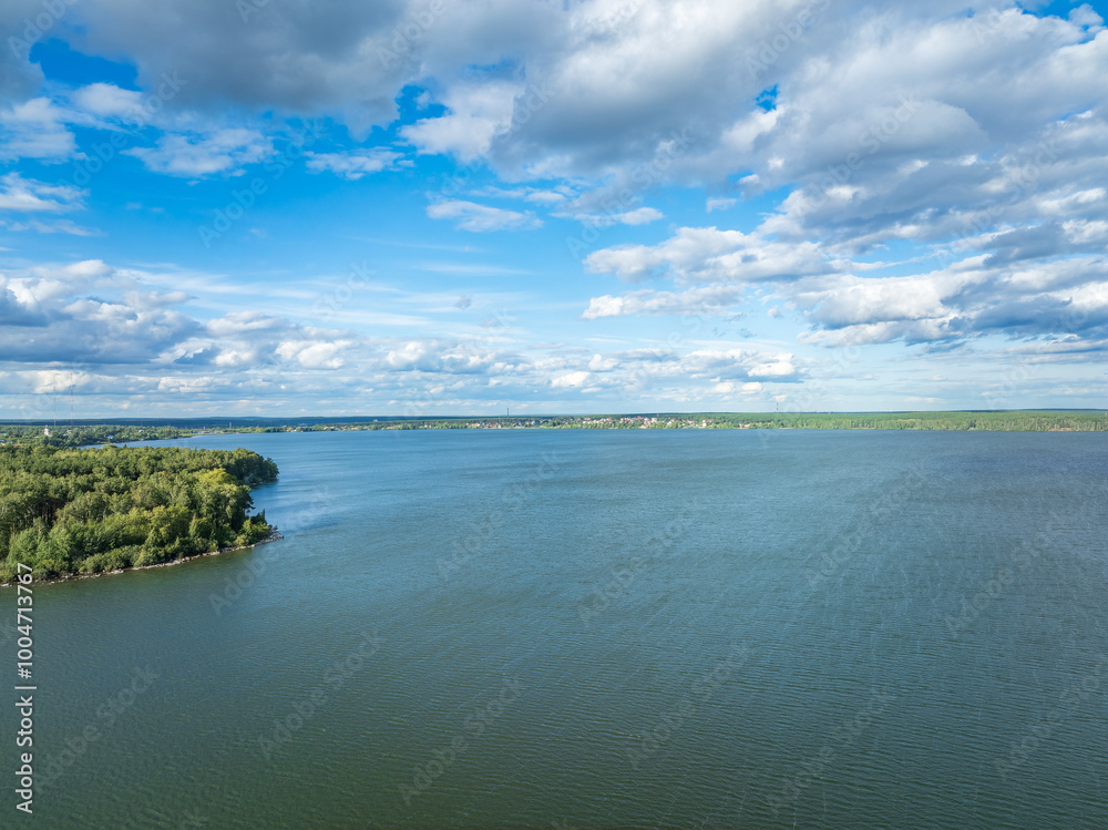 Aerial view of lake or river green shore with forest. Summer season. Aerial view of lake or river green shore with forest. Summer season.