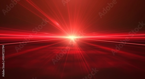 Red light is shining on a red background. The light is bright and intense, creating a sense of energy and excitement