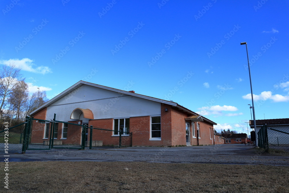School brick building. Spring day in April 2024. Slottsskolan, Skokloster, Sweden. School brick building. Spring day in April 2024. Slottsskolan, Skokloster, Sweden.