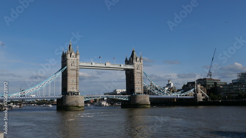 View of Tower Bridge in London, spanning the River Thames. Showcasing the iconic bridge's stunning Gothic architecture and its prominent role in the city's skyline.