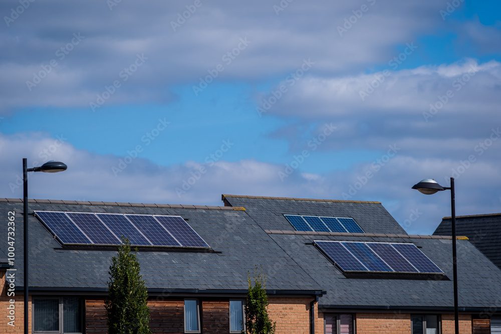 Fototapeta premium Solar energy panel on new built house roof in england uk