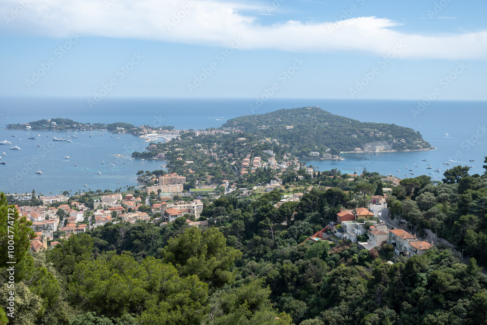 Panoramic view of Saint-Jean-Cap-Ferrat commune in Alpes-Maritimes in Provence-Alpes-Cote d'Azur, French Riviera, France Panoramic view of Saint-Jean-Cap-Ferrat commune in Alpes-Maritimes in Provence-Alpes-Cote d'Azur, French Riviera, France