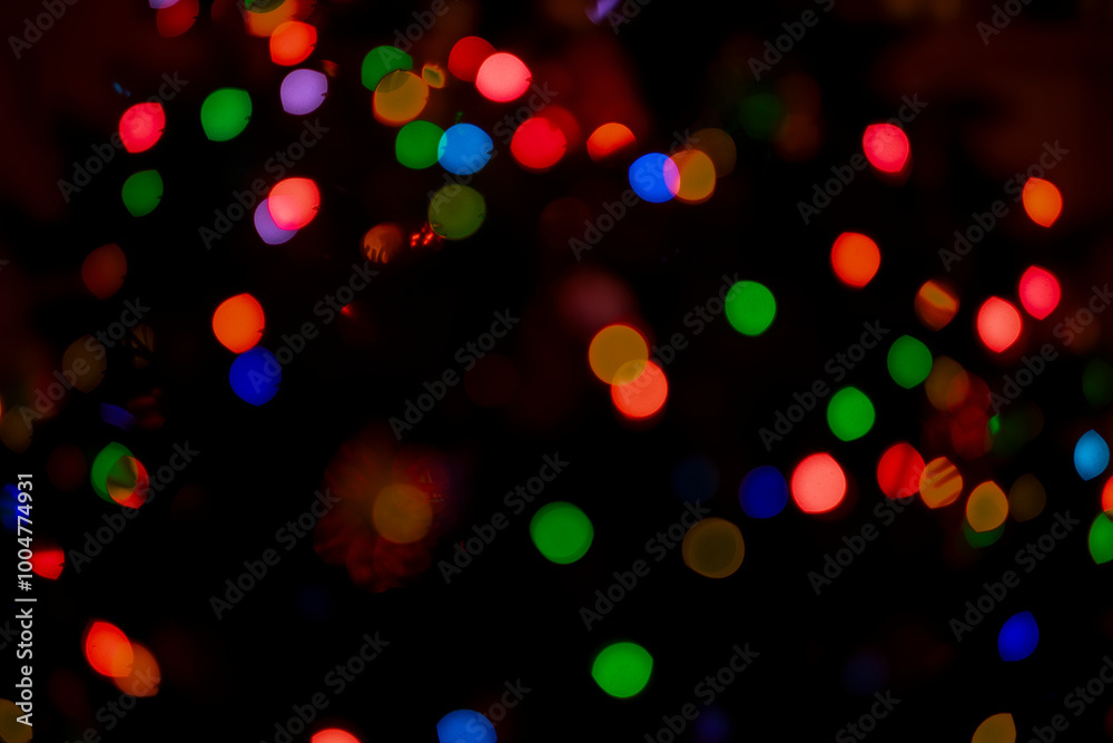 Colorful Swirling Lenticular Bokeh Balls of Christmas Tree Lights Decoration for Festive Holiday Season Colorful Swirling Lenticular Bokeh Balls of Christmas Tree Lights Decoration for Festive Holiday Season