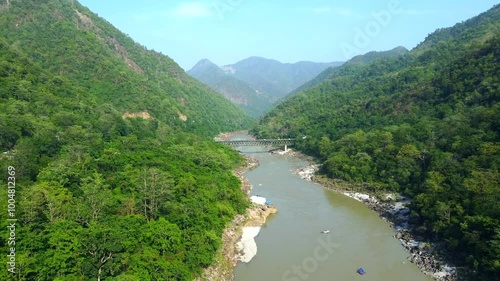 Aerial view of the beautiful holy river Ganges and neelkanth bridge in rishikesh uttarakhand India. photo