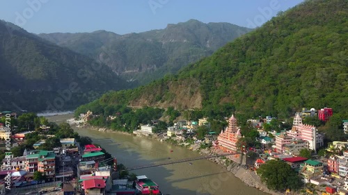 Rishikesh, uttrakhand, India 22 june 2022. Aerial view of the beautiful holy river ganga, lakshman Jhula bridge, and tera manzil temple, trimbakeshwar in rishikesh.