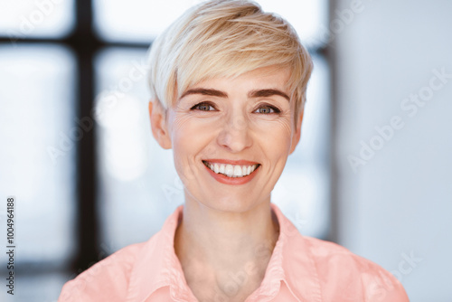 Portrait Of Happy Businesswoman Smiling Looking At Camera Posing In Modern Office. Successful Business People. Selective Focus