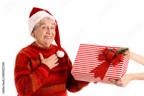 Senior woman in Santa hat r...