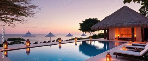 Serene and luxurious outdoor setting at sunset, featuring an infinity pool that seamlessly blends with the horizon of the ocean. 