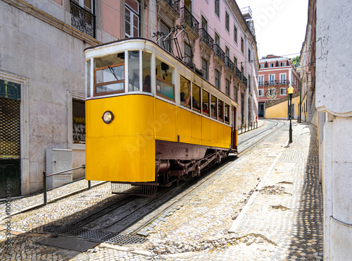 Funicular tram at Gloria Elevador route in Lisbon, Portugal photo