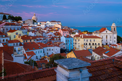 Twilight view of Alfama, one of Lisbon’s oldest areas with shops selling traditional crafts and cafes, Portugal