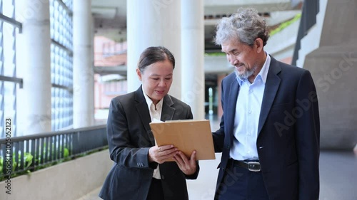 Team of senior executive managers is happily handshaking after meeting for new contract and partnership between corporation agreement and investment opportunity for global expansion concept