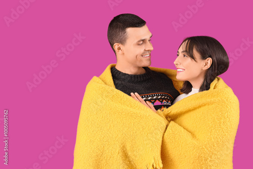 Happy young couple with pla...