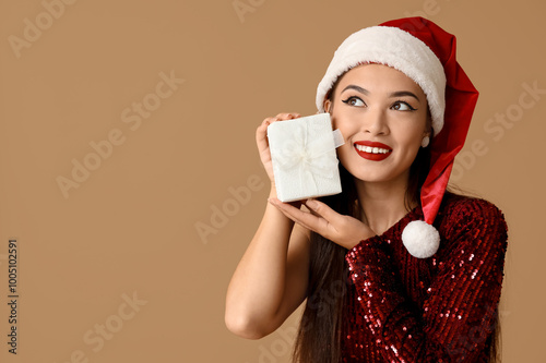 Smiling young woman in sant...