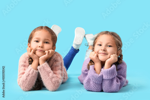 Cute little girls in warm s...