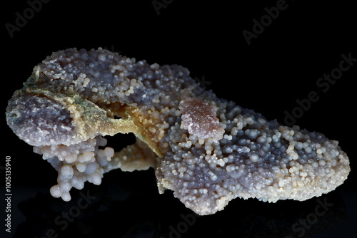 Collectible mineral Grape chalcedony or grape agate on a dark background, deposit Indonesia photo