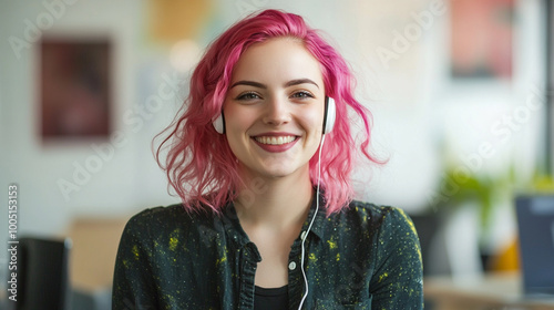 Young smiling pink haired woman wearing earphones, headphones  photo