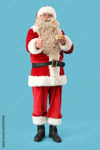 Santa claus holding a small...