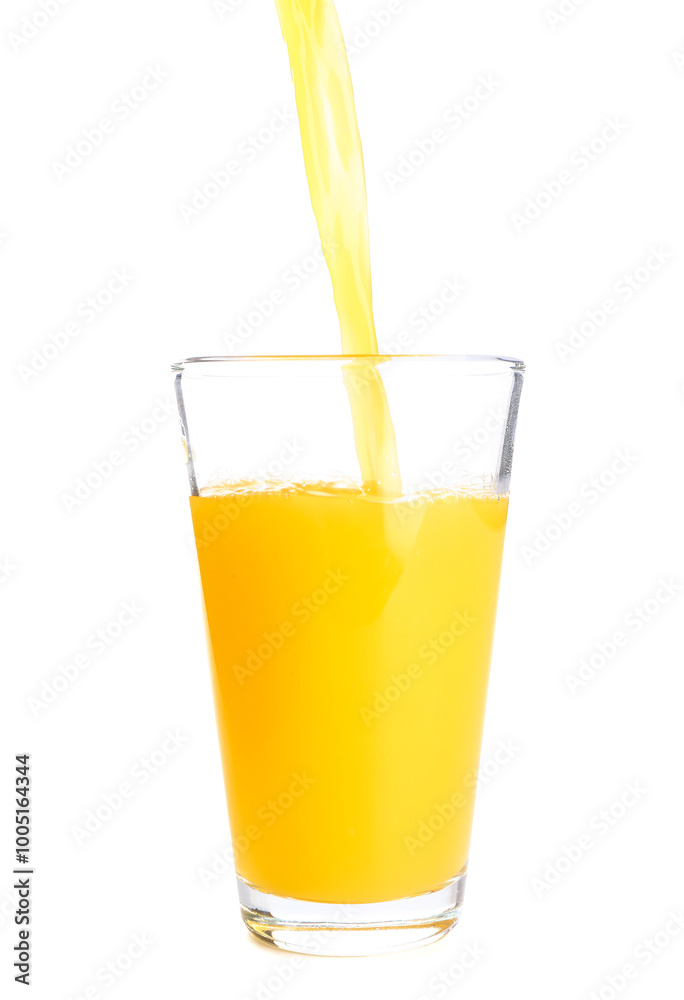 Pouring of fresh orange juice into glass on white background Pouring of fresh orange juice into glass on white background