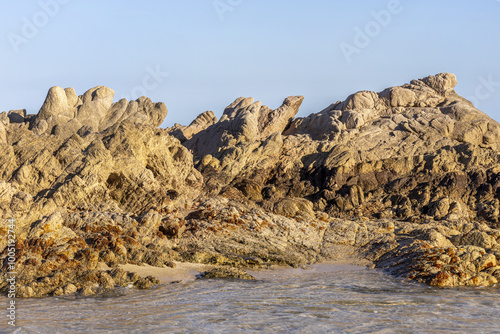 Beautiful sunny day on a rocky beach in Los Cabos, Baja California Sur, Mexico. photo