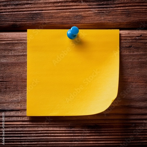 Sticky note on a rustic wooden table background photo