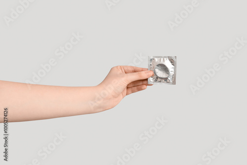 Female hand with wrapped co...