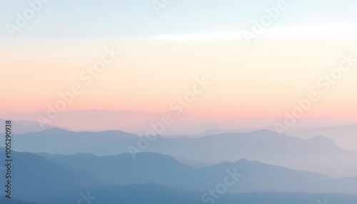 Ethereal Watercolor Landscape of Pastel Mountains with Gradient Sky from Blue to Pale Yellow