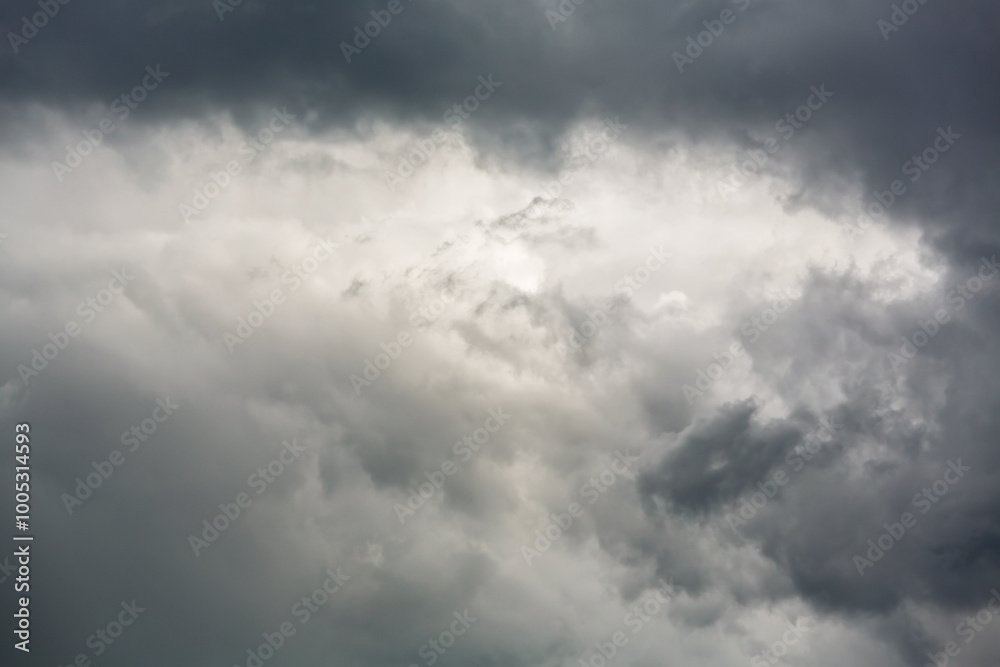 dark dramatic sky with overcast grey clouds before thunderstorm. dark dramatic sky with overcast grey clouds before thunderstorm.